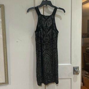 Cute little black dress with silver detail